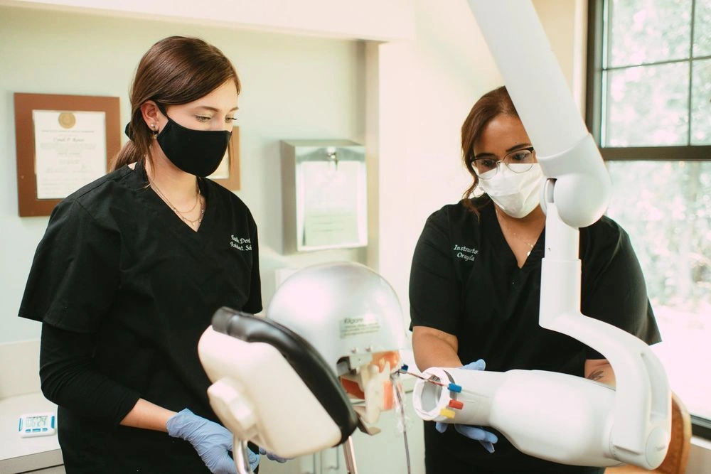{{ school.name }} students training to capture dental x-rays